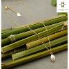Collier en Acier doré Merveilles du monde