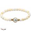 Bracelet billes nacre blanche et cabochon acier doré et nacre blanche, Collectio